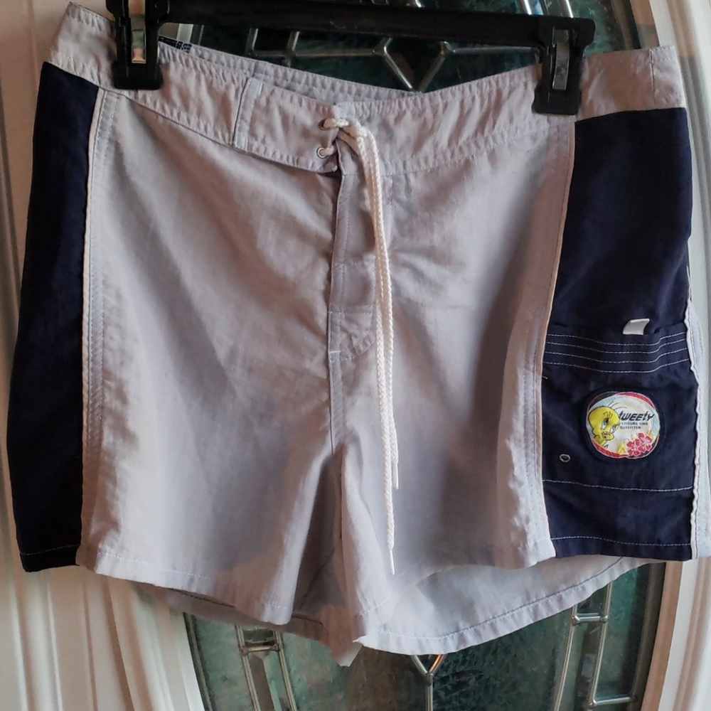 Kids size 13/14 pool shorts by looney Tunes
